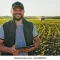happy-farmer-stands-smile-holds-260nw-2212480131